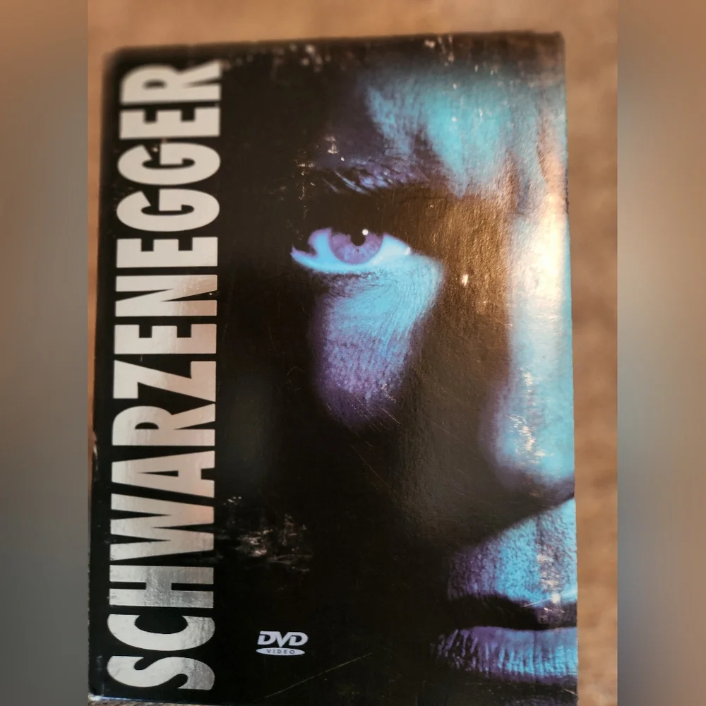 NWOT Arnokd Schwarzenegger Action Movie DVD Collection, 4 DVDs